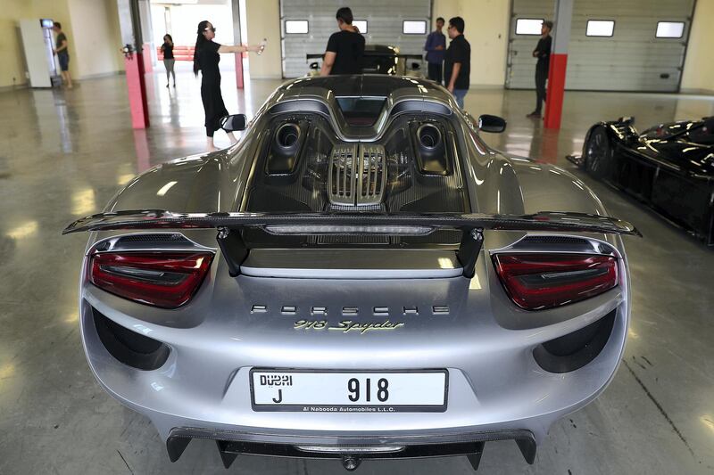 DUBAI, UNITED ARAB EMIRATES, August 31 – 2018 :- Porsche 918 Spyder at the Dubai Autodrome in Dubai. Members and Guests of the Ninth Degree supercars club driving their cars during the Ninth Degree supercars club meet held at Dubai Autodrome in Dubai. ( Pawan Singh / The National )  For Motoring. Story by Adam Workman
