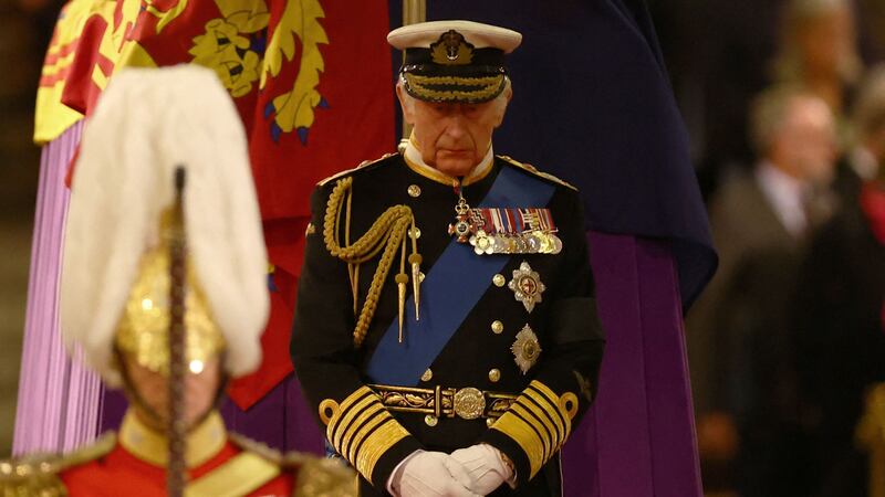 King Charles attends a vigil alongside Queen Elizabeth's coffin inside Westminster Hall. Getty Images