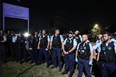New South Wales police guard the perimeter of the Christ the Good Shepherd Church in Sydney's western suburb of Wakeley after the stabbing. AFP