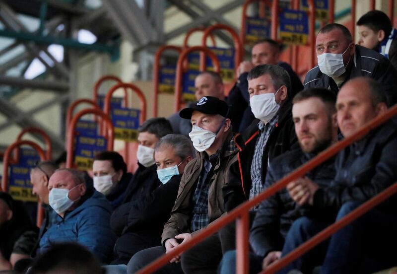 Fans attend the Vysheyshaya Liga match between Dynamo Brest and Isloch Minsk at the OSK Brestsky Stadium in Belarus on Sunday. Reuters