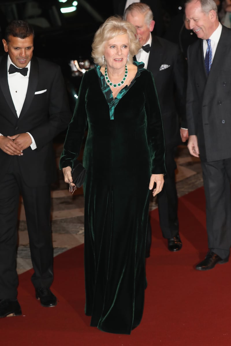 The queen consort, in a green velvet gown, attends a reception for supporters of The British Asian Trust on February 2, 2017 in London. Getty Images