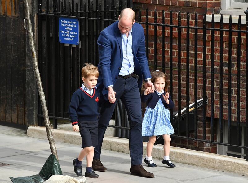 Prince William with Prince George and Princess Charlotte at the Lindo Wing after his wife Kate gave birth to their second son, Louis, at St Mary's Hospital in April 2018 in London. Getty