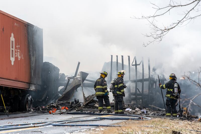 Firefighters work at the scene of a multi-vehicle crash on the Interstate 81 North motorway near the Minersville exit in Foster Township, Pennsylvania, the US. Republican-Herald / AP