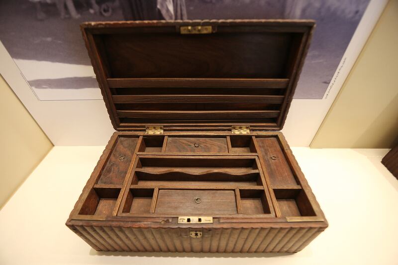 A wooden box used by pearl merchants on display at the museum.