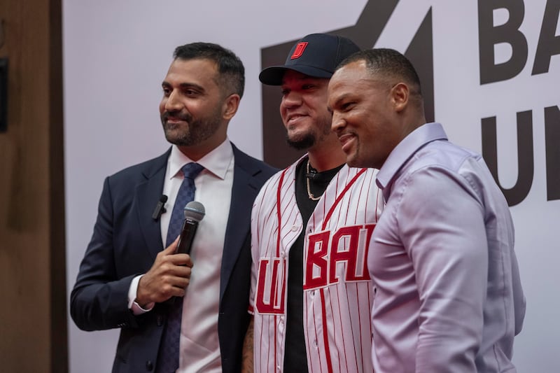 Former MLB stars Felix Hernandez, centre, and Adrian Beltre, right, with Baseball United’s chief executive Kash Shaikh, left, at the official launch of Baseball United’s Dubai Showcase on Thursday, August 3, 2023. All photos: Antonie Robertson / The National