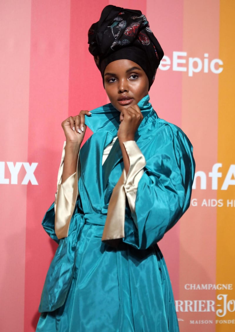 epa07537118 (FILE) - Model Halima Aden arrives at the amfAR charity dinner during the Milan Fashion Week, in Milan, Italy, 22 September 2018 (Reissued 29 April 2019). According to reports on 29 April 2019, Somali-American model Halima Aden, 21, will become the first Sports Illustrated cover girl wearing a burkini and a hijab in the 2019 annual swimsuit issue.  EPA/MATTEO BAZZI *** Local Caption *** 54646116