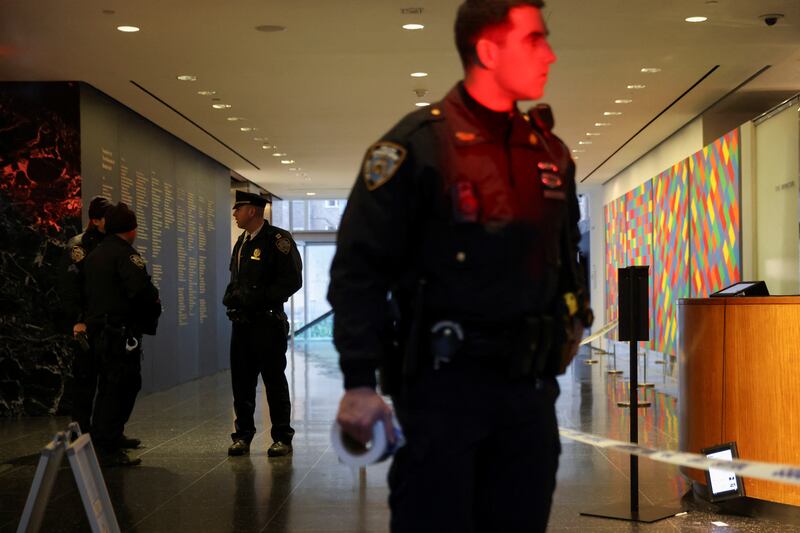 Police in the museum lobby, where two employees were stabbed. Reuters