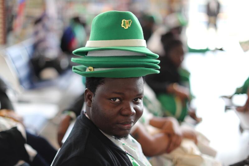 A Nigerian fan waits for a flight at Sheremetyevo International Airport in Moscow, Russia, on June 17, 2018. Lucy Nicholson / Reuters