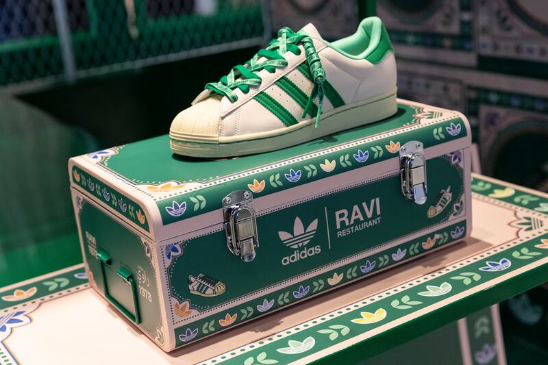 Adidas x Ravi Restaurant trainers on sale at adidas's flagship store in The Dubai Mall. Antonie Robertson / The National
