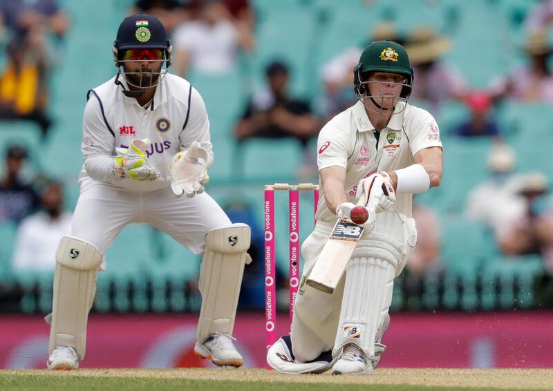 Australia's Steve Smith plays a scoop shot. AP