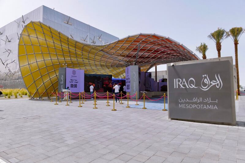 The Iraq pavilion has a distinctive canopy that looks like a net cast from a boat into the water.