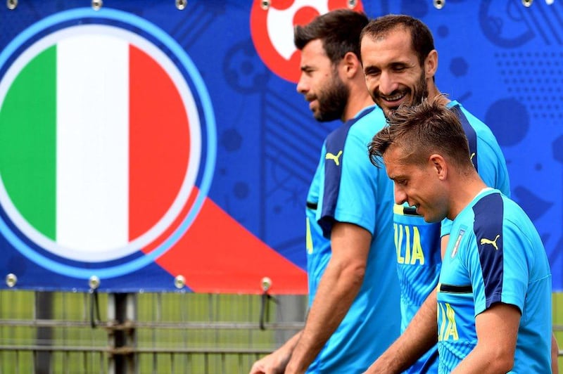 Italy's Andrea Barzagli (L), Giorgio Chiellini (C) and Emanuele Giaccherini attend a training session on Thursday ahead of their Friday match against Sweden at Euro 2016. Vincenzo Pinto / AFP / June 16, 2016 