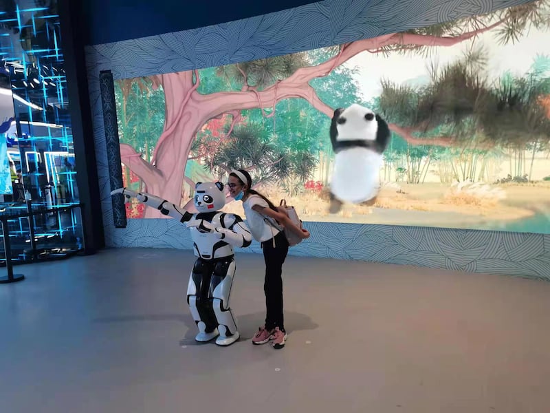 A panda robot inspired by the famous giant Chinese pandas shows some moves to visitors at the China pavilion at Expo 2020 Dubai.