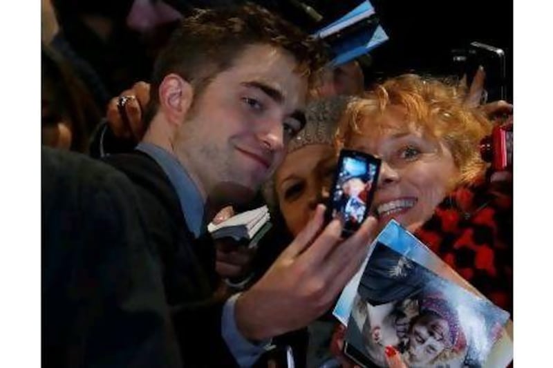 Star Robert Pattinson meets fans at this week's London premiere of The Twilight Saga: Breaking Dawn Part 2. A reader hopes that all vampire films are now dead and buried. Luke MacGregor / Reuters