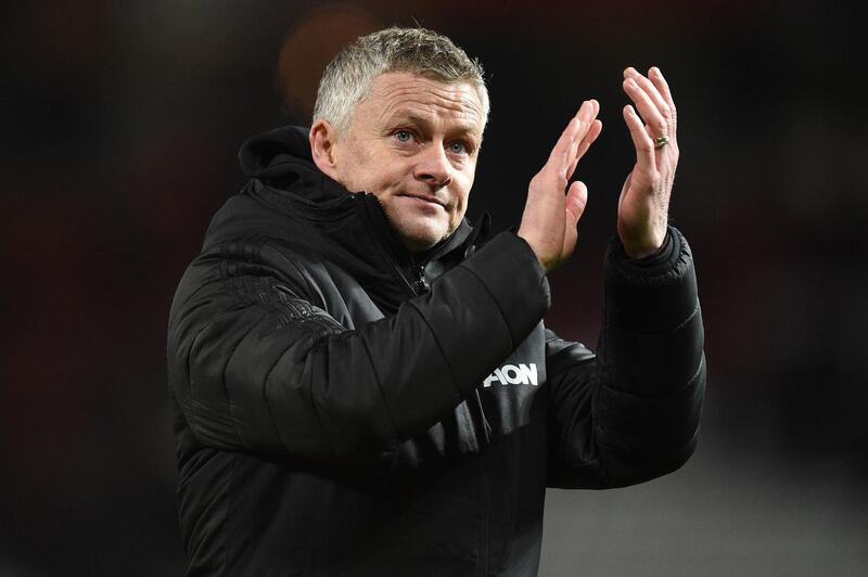 Manchester United manager Ole Gunnar Solskjaer applauds supporters. AFP