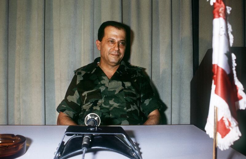 (FILES) Lebanese General and opposition leader Michel Aoun, 39, is pictured 13 July 1984 in his office in East Christian Beirut. A soldier turned politician, Aoun, was booted out of Lebanon in 1990 by the Syrian army, which he had bitterly fought but failed to crush, and forced into 15 years of exile in France. A Lebanese court suspended on Thursday 04 May 2005 an arrest warrant against Aoun from exile, paving the way for his return from France which many here fear could disrupt Lebanon's fragile political structure. The court also decided to delay a ruling in a 2003 case against Aoun, who is due to return to Beirut on Saturday 07 May, over comments that were deemed to have damaged Lebanon's relations with Syria.      AFP PHOTO JOSEPH BARRAK (Photo by JOSEPH BARRAK / AFP)