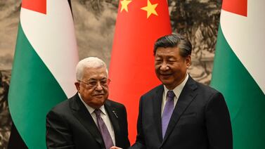 Palestinian President Mahmoud Abbas shakes hands with China’s President Xi Jinping in June 2023. Getty