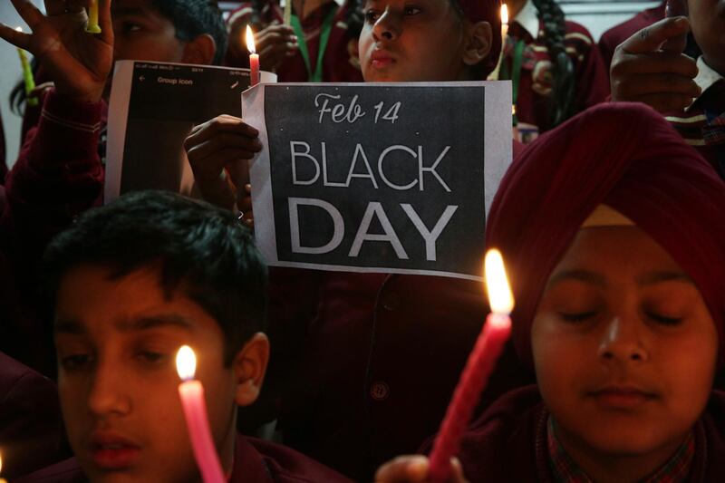 Students in Armistar, India hold candles and posters as they pay tibute to the Indian Central Reserve Police Force (CRPF) personnel killed in a Kashmir car bombing.  EPA