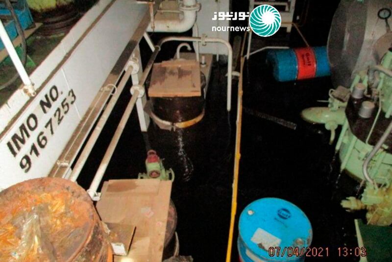 This photo released by Nournews on Thursday, April 8, 2021, shows the flooded engine room of the Iranian ship MV Saviz after being attacked in Red Sea off Yemen. An attack Tuesday on the Iranian cargo ship said to serve as a floating base for its paramilitary Revolutionary Guard off Yemen has escalated a yearslong shadow war on Mideast waters, just as world powers negotiate over Tehran's tattered nuclear deal. (Nournews via AP)