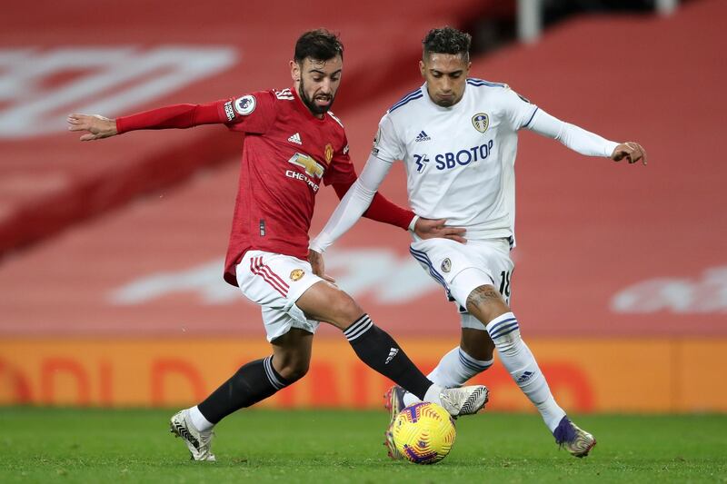 Bruno Fernandes of Manchester United in action against Raphinha of Leeds. EPA