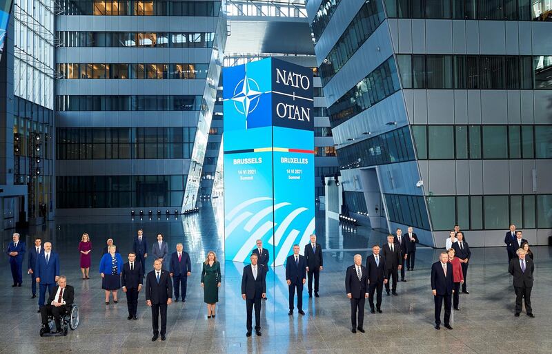 epa09270374 NATO heads of states and governments pose for the family picture during the NATO summit at the Alliance's headquarters, in Brussels, Belgium, 14 June 2021. The 30-nation alliance hopes to reaffirm its unity and discuss increasingly tense relations with China and Russia, as the organization pulls its troops out after 18 years in Afghanistan.  EPA/Horst Wagner / POOL