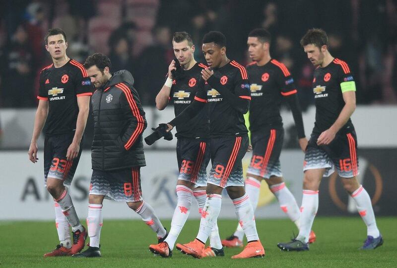 Manchester United players show their dejection after their 1-2 defeat in the Europa League round of 32 first leg match against FC Midtjylland at Herning MCH Multi Arena on February 18, 2016 in Herning, Denmark. (Photo by Michael Regan/Getty Images)