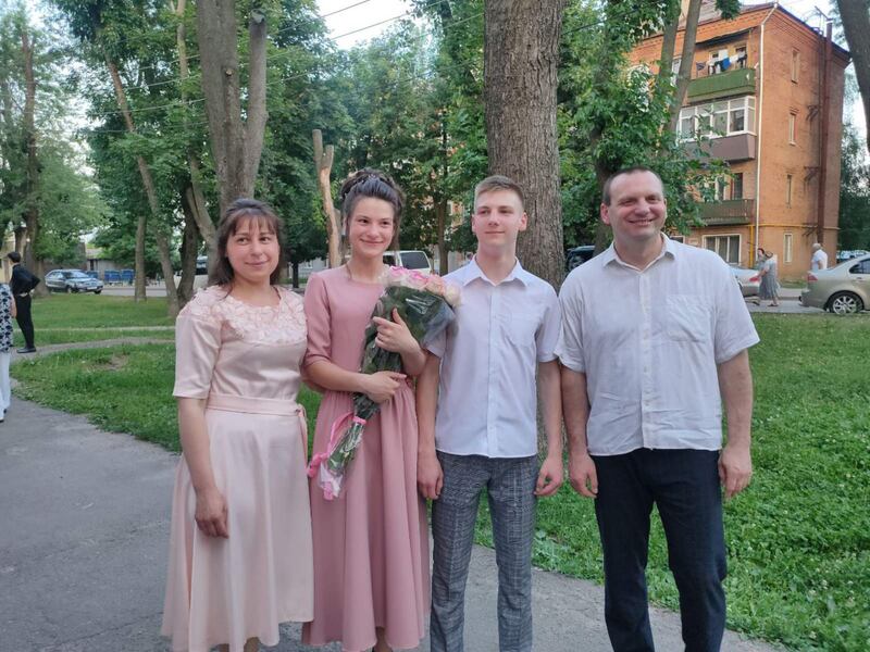 Margarita Nonka, a Ukrainian teacher, with her children and husband after a school prom in Kharkiv last year. Photo: Margarita Nonka