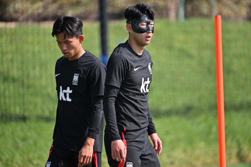 South Korea's Son Heung-min, right, and midfielder Jeong Woo-yeong take part in a training session at Al Egla training centre on Saturday, November 19, 2022, ahead of the Qatar World Cup. AFP