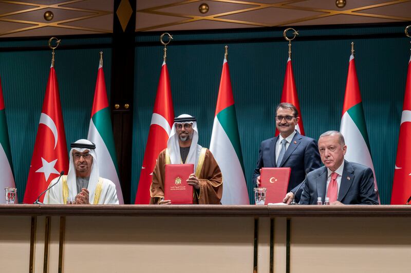 Sheikh Mohamed and Mr Erdogan watch a signing ceremony between UAE Energy Minister Suhail Al Mazrouei and his Turkish equivalent Fatih Donmez. Mohamed Al Hammadi / Ministry of Presidential Affairs