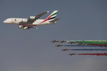 An Emirates Airline A-380 leads the "Al Fursan", or the Knights, a UAE Air Force aerobatic display team, during the opening day of the Dubai Air Show 2017. AP. 