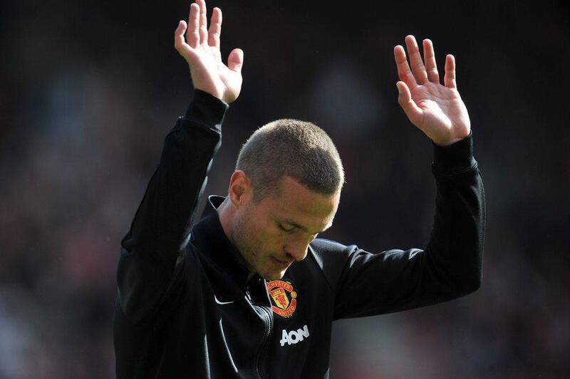 Nemanja Vidic waves to the crowd after his final match with Manchester United on May 11, 2014 against Southampton. Glyn Kirk / AFP