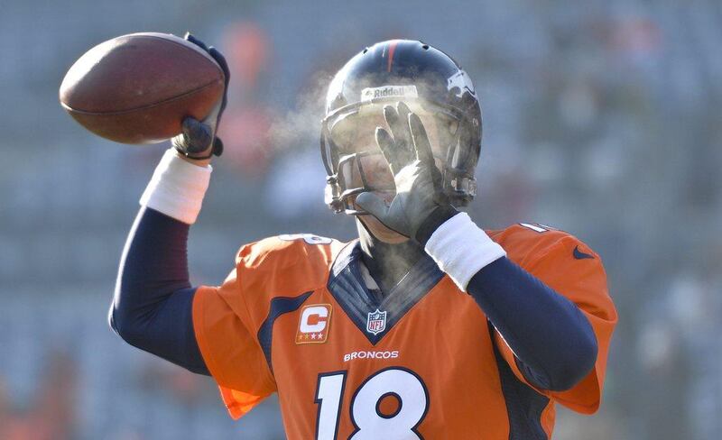 It wasn't snowing in Denver, Colorado where the Denver Broncos defeated the Tennessee Titans 51-28, but it was cold enough for Peyton Manning to see his breath. Jack Dempsey / AP