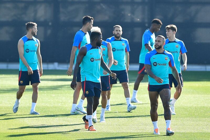 Barcelona's Dutch forward Memphis Depay, right, during a squad training session. AFP