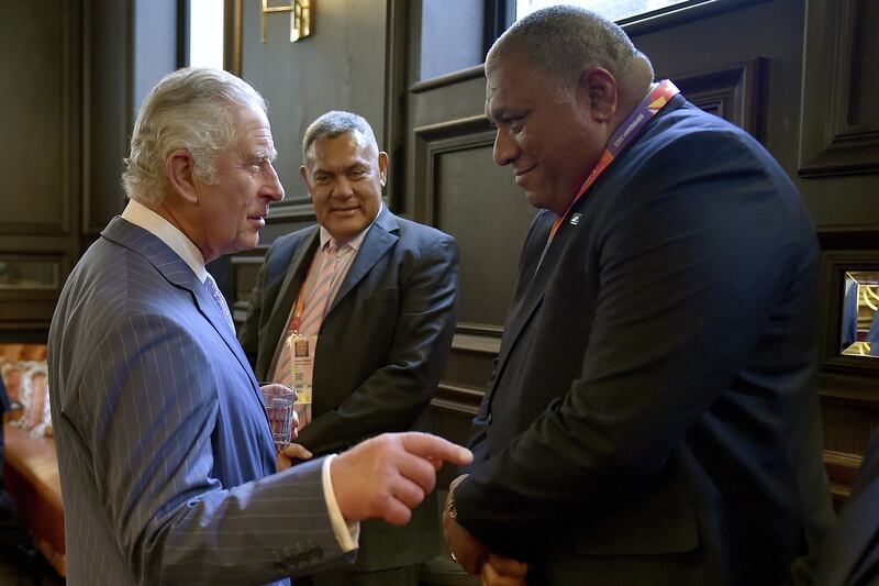 The Prince of Wales speaks to Fijian President Ratu Wiliame Katonivere during the Opening Reception for the Commonwealth Games. PA 