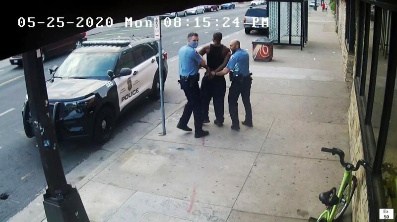 This image from video shows Minneapolis police Officers Thomas Lane, left and J. Alexander Kueng, right, escorting George Floyd, center, to a police vehicle outside Cup Foods in Minneapolis, on May 25, 2020. The image was shown as prosecutor Steve Schleicher gave closing arguments as Hennepin County Judge PeterÂ Cahill presided Monday, April 19, 2021, at the Hennepin County Courthouse in Minneapolis, in the trial of Derek Chauvin for the death of George Floyd. (Court TV via AP, Pool)