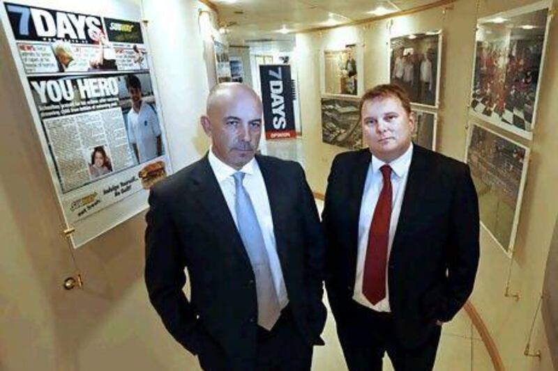 Mark Rix, left, the chief executive, and Will Breitholtz, the digital manager, of Al Sidra Media, publisher of 7DAYS. Charles Crowell for The National