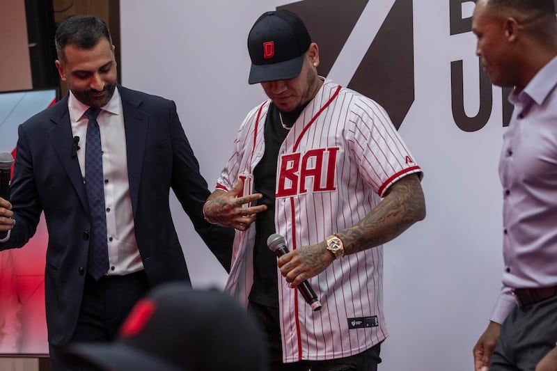 Baseball United’s chief executive Kash Shaikh, left, with Seattle Mariners Hall of Famer Felix Hernandez. centre, and former MLB star Adrian Beltre, right.