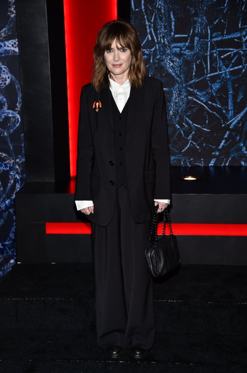 Winona Ryder in a three-piece suit at the premiere of 'Stranger Things' season 4 at Netflix Studios Brooklyn on Saturday, May 14, 2022, in New York. AP