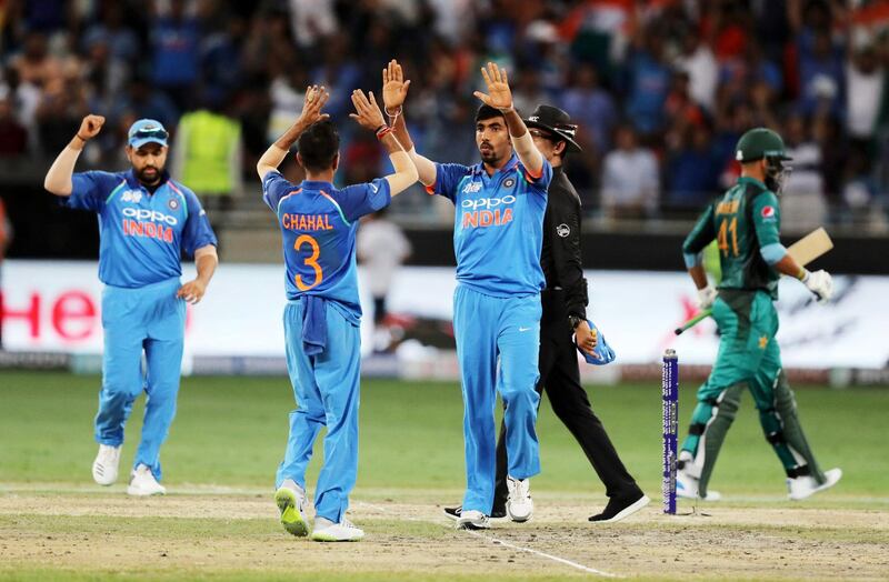 DUBAI , UNITED ARAB EMIRATES, September 19 , 2018 :- Jasprit Bumrah ( center ) of India celebrating after taking the wicket of Faheem Ashraf  during the Asia Cup UAE 2018 cricket match between Pakistan vs India held at Dubai International Cricket Stadium in Dubai. ( Pawan Singh / The National )  For Sports. Story by Paul