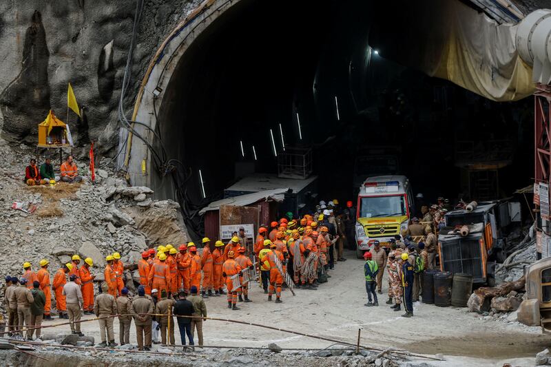 Disaster Response personnel wait to enter the tunnel in Uttarkashi where 41 workers were trapped. Reuters