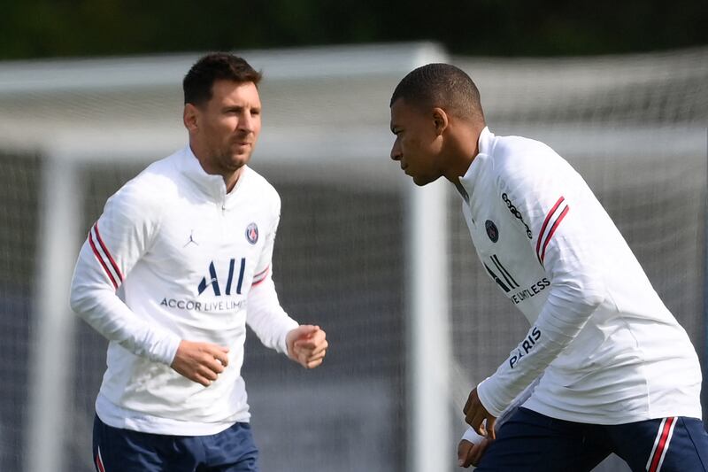 Kylian Mbappe and Messi. AFP