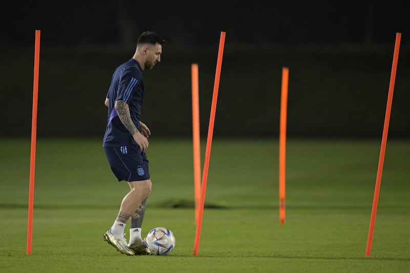 Lionel Messi dribbles the ball during an Argentina training session at Qatar University in Doha on December 2, 2022, on the eve of the Qatar 2022 World Cup match against Australia. AFP