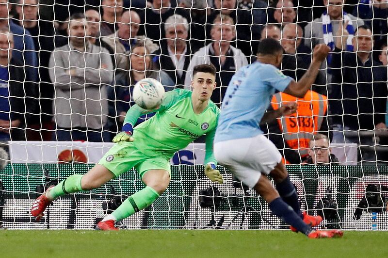 Manchester City's Raheem Sterling scores from the penalty spot during the shootout to win the match. Action Images via Reuters