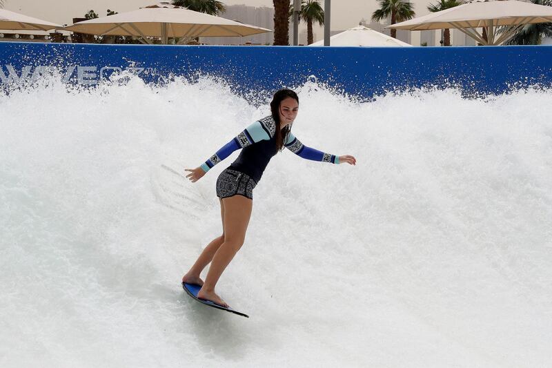 DUBAI , UNITED ARAB EMIRATES , MAY 12 – 2018 :- Tegan Storm Friedenthal enjoying at the Flow Rider in the Laguna Waterpark in La Mer in Dubai.  ( Pawan Singh / The National )  For News/ Big Picture / Weekend. Story by Salam Al Amir