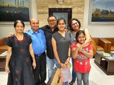 Jagdish Tanna, second left, a UAE resident of more than 40 years, with his family in happier times. Mr Tanna lost a month-long battle to Covid-19 in March. Courtesy: Tanna family