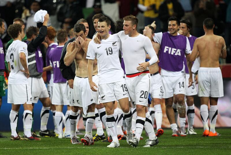 NELSPRUIT, SOUTH AFRICA - JUNE 20:  Tommy Smith and Chris Wood of New Zealand celebrate with team mates after a draw in the 2010 FIFA World Cup South Africa Group F match between Italy and New Zealand at the Mbombela Stadium on June 20, 2010 in Nelspruit, South Africa.  (Photo by Streeter Lecka/Getty Images)