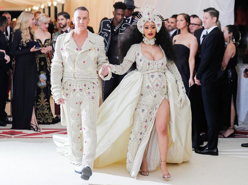 Jeremy Scott and Cardi B in Moschino at the 2018 Met Gala. Reuters