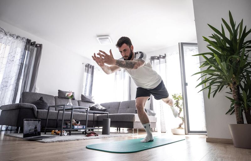 AUGSBURG, GERMANY - APRIL 08: Marco Richter of Bundesliga club FC Augsburg trains in his apartment via internet with his personal coach Arne Greskowiak on April 08, 2020 in Augsburg, Germany. (Photo by Lars Baron/Bongarts/Getty Images)
