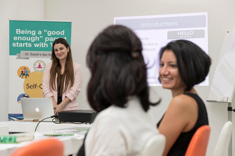 DUBAI, UNITED ARAB EMIRATES. 21 September 2017. Dr Sarah Rashmi (Ph.D) Psychologist and Professor teachinig at her Parenting Workshop held at KidsHQ. In te forefront is parents (LtoR)
Purvi Kotecha and Sarah Ghobrial. (Photo: Antonie Robertson/The National) Journalist: Hala Khalaf. Section: National.