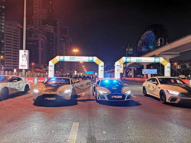 Dubai Police supercars lead the way at the start of the Dubai Run. Photo: Dubai Media Office